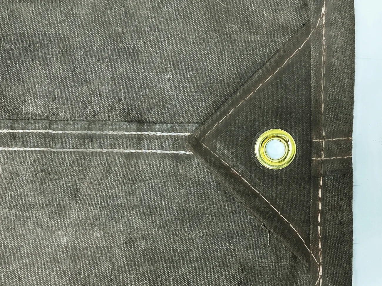 flame resistant canvas tarp with reinforced patches