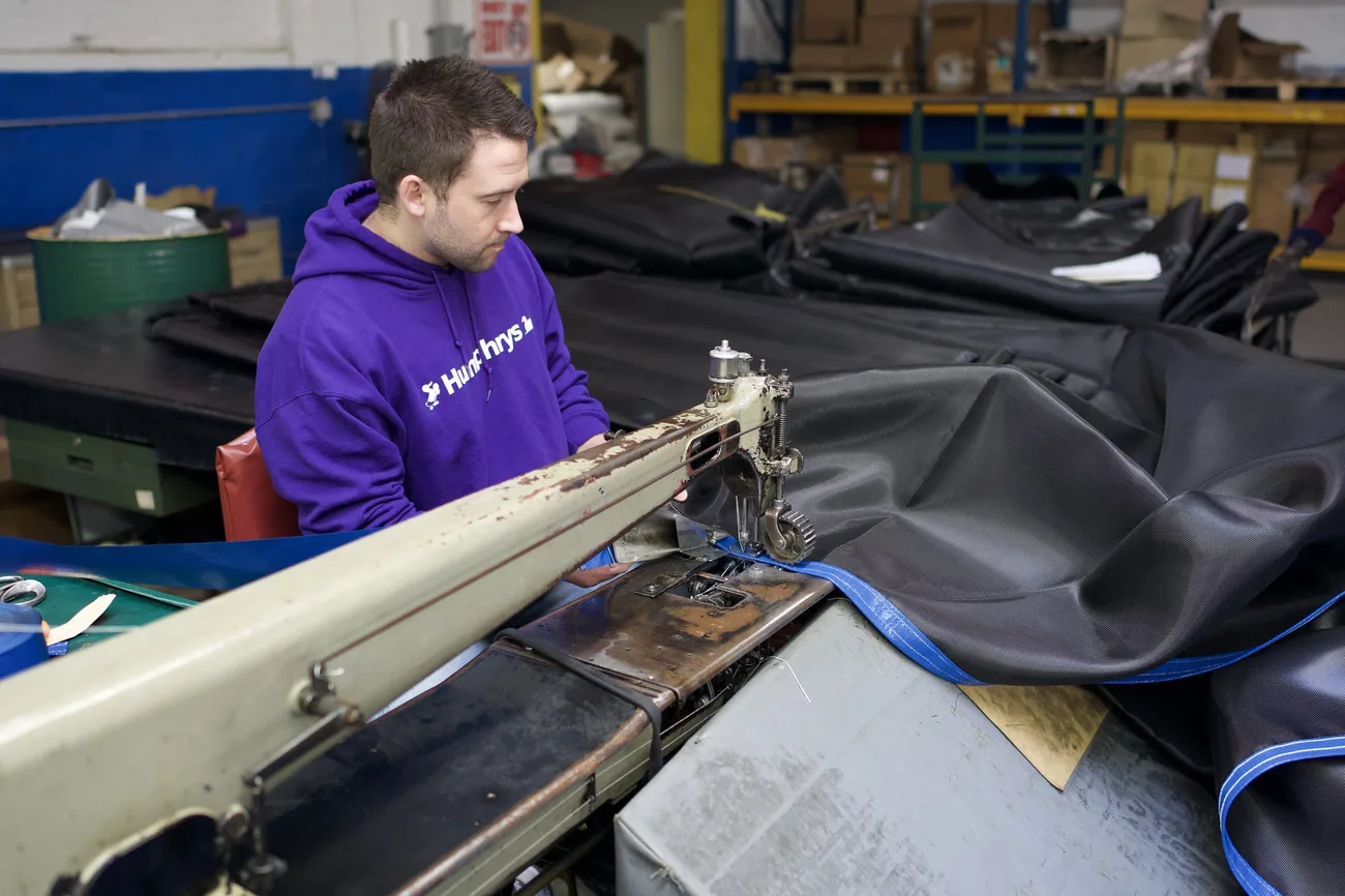 reinforcing with industrial sewing during tarp manufacturing