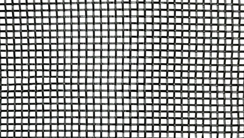 Close-up of Super Mesh PVC coated polyethylene dump truck tarp material showing flexible 55% closed weave pattern