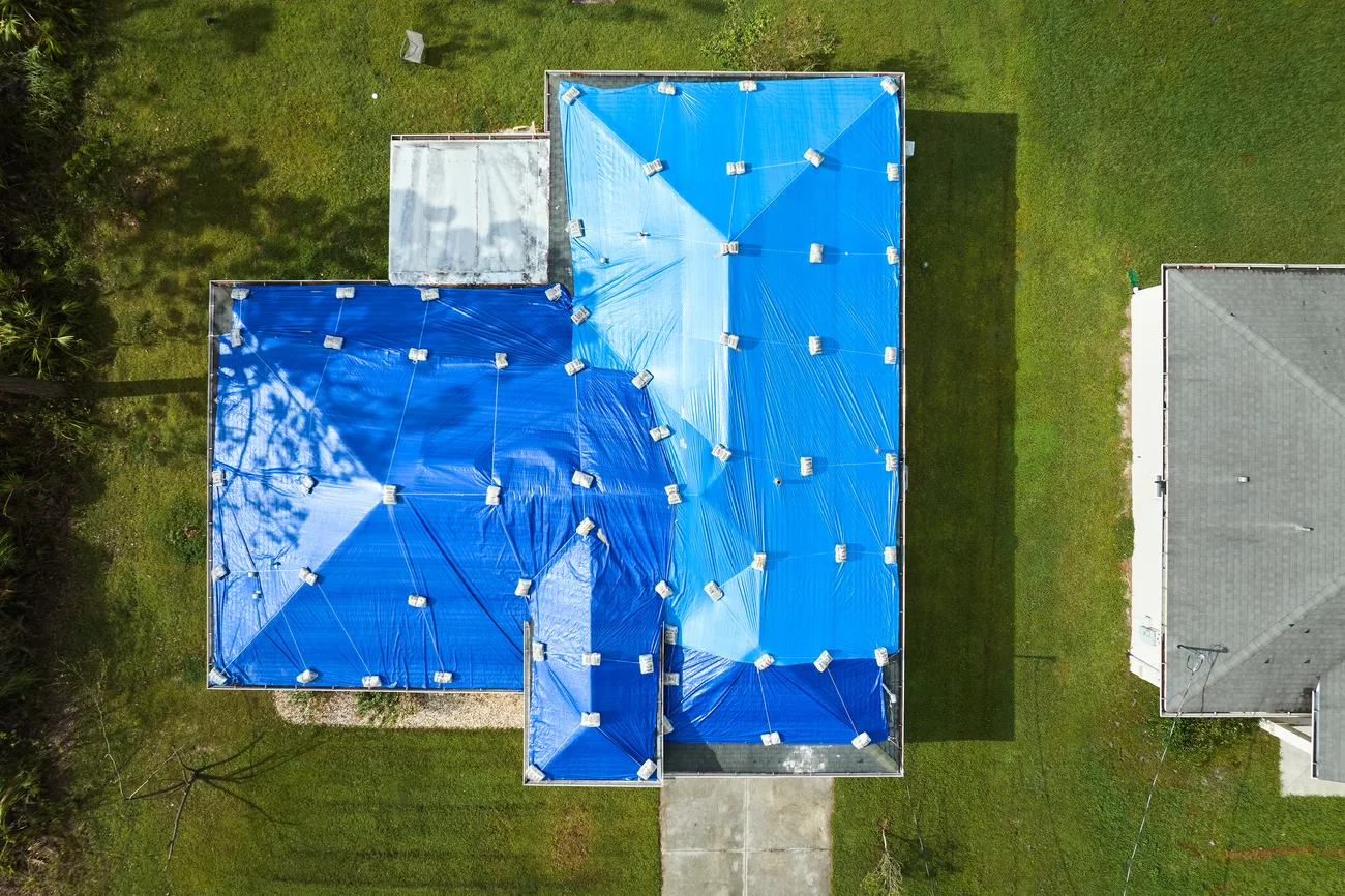 tarp on roof after storm