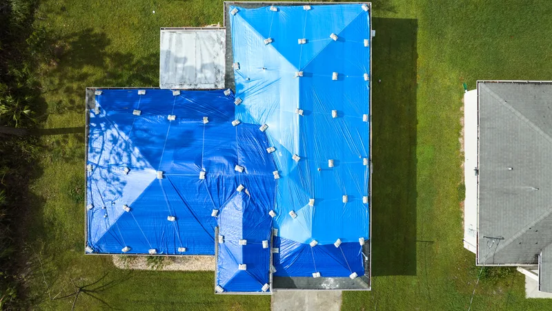 emergency tarp cover after storm leaks